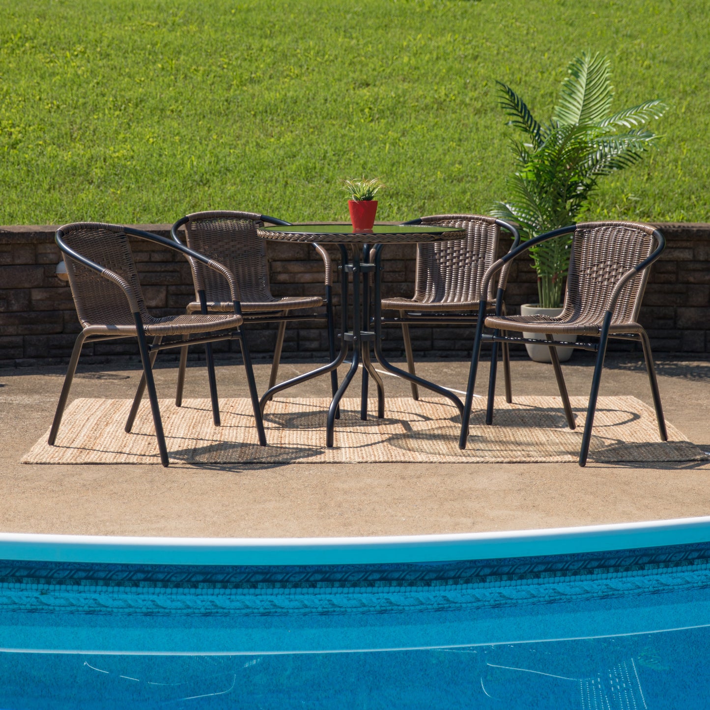 28'' Round Glass Metal Table with Rattan Edging and 4 Rattan Stack Chairs Set